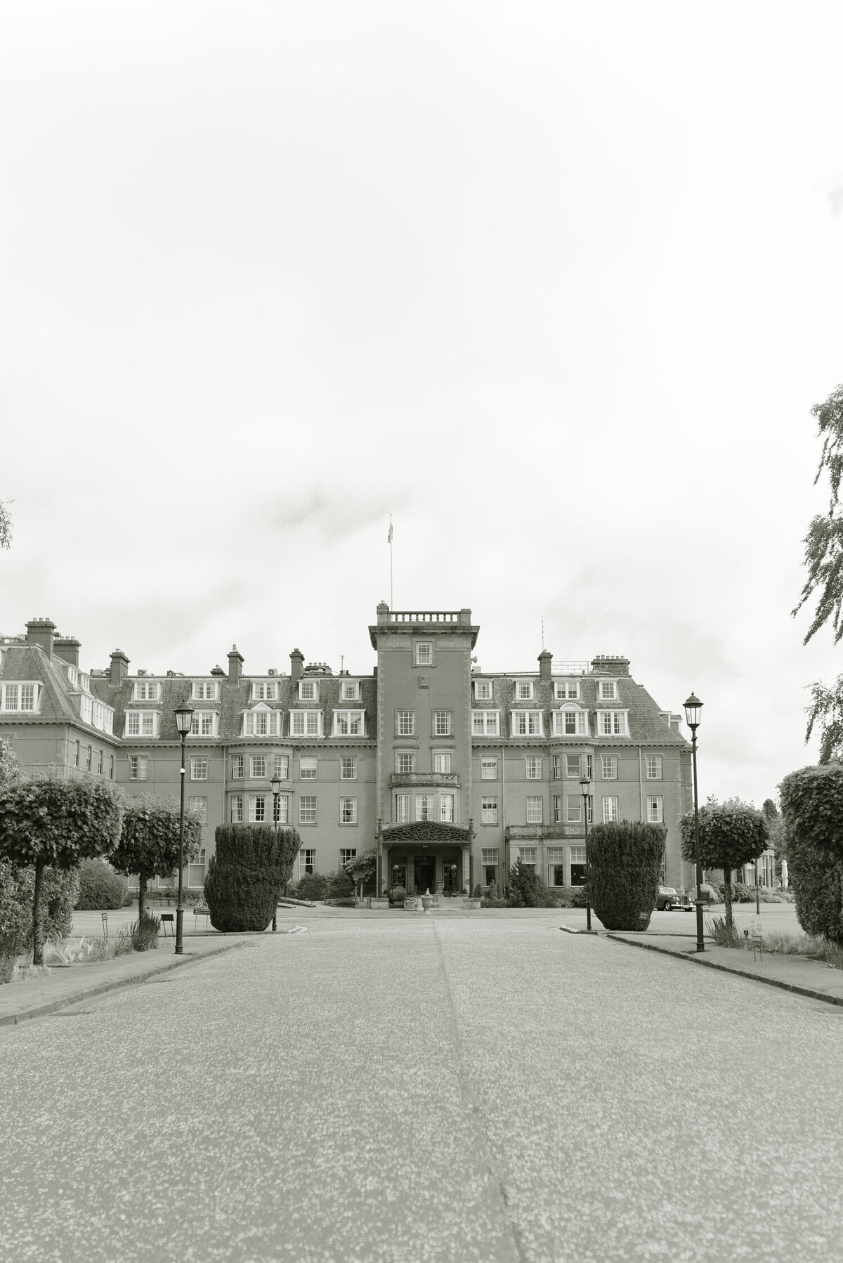 Black and white image of the exterior of Gleneagles Hotel by Jill Cherry Porter Photography, Scotland wedding photographer.