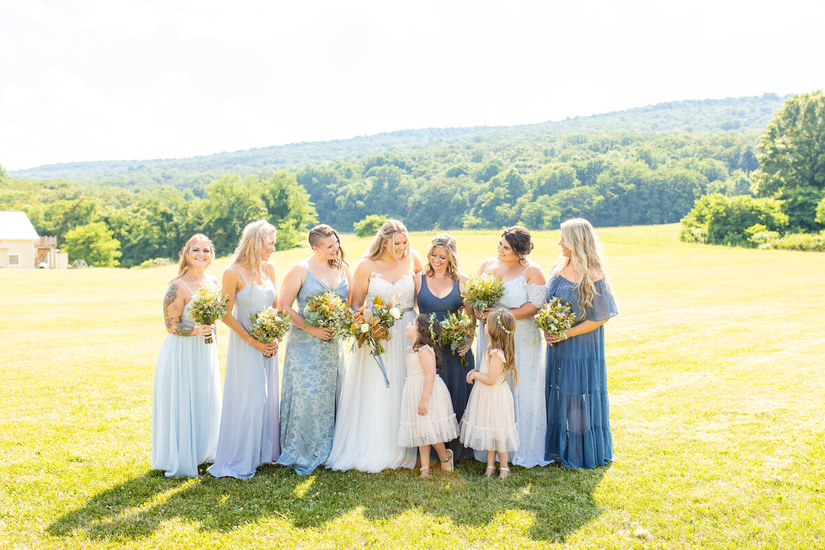 Bride with her bridesmaids and flower girls