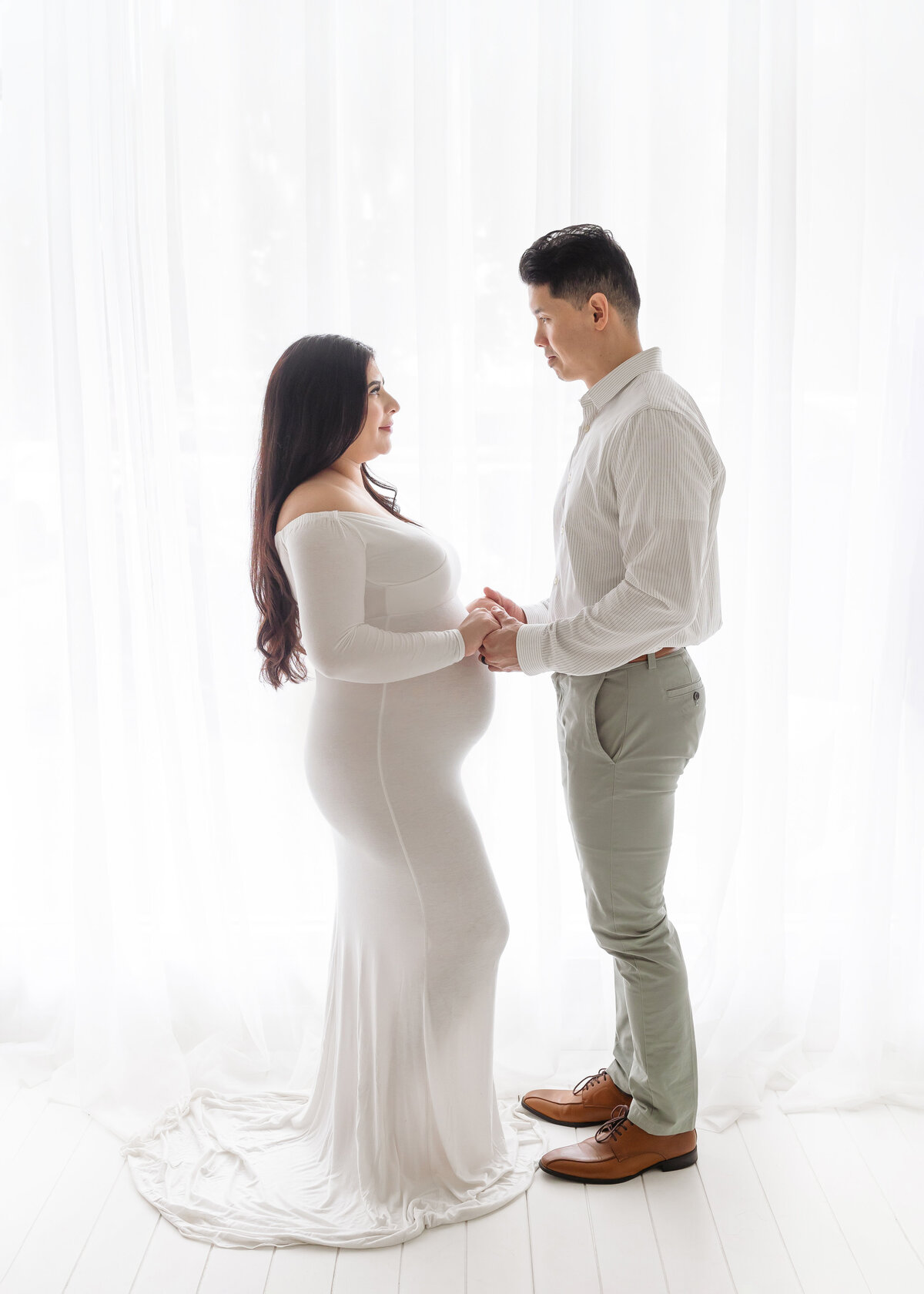 future parents looking at each other