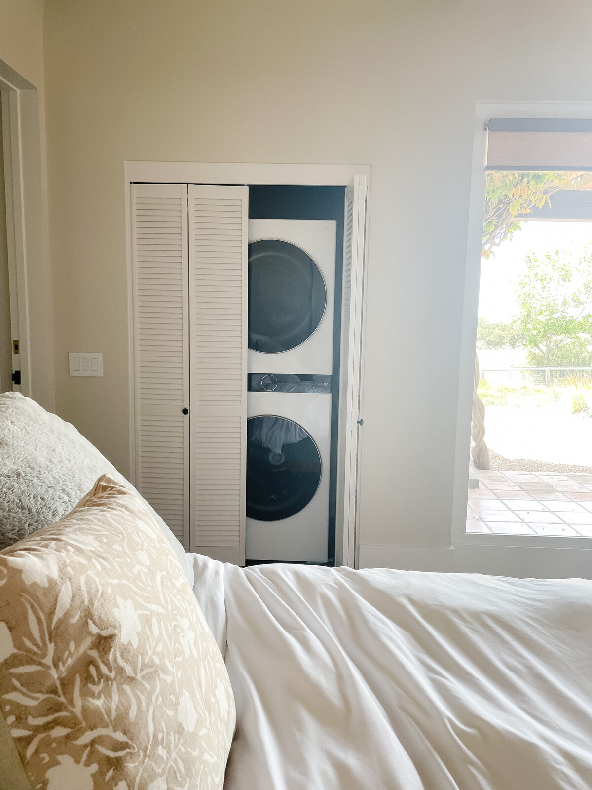 laundry closet inside a  luxury home bedroom