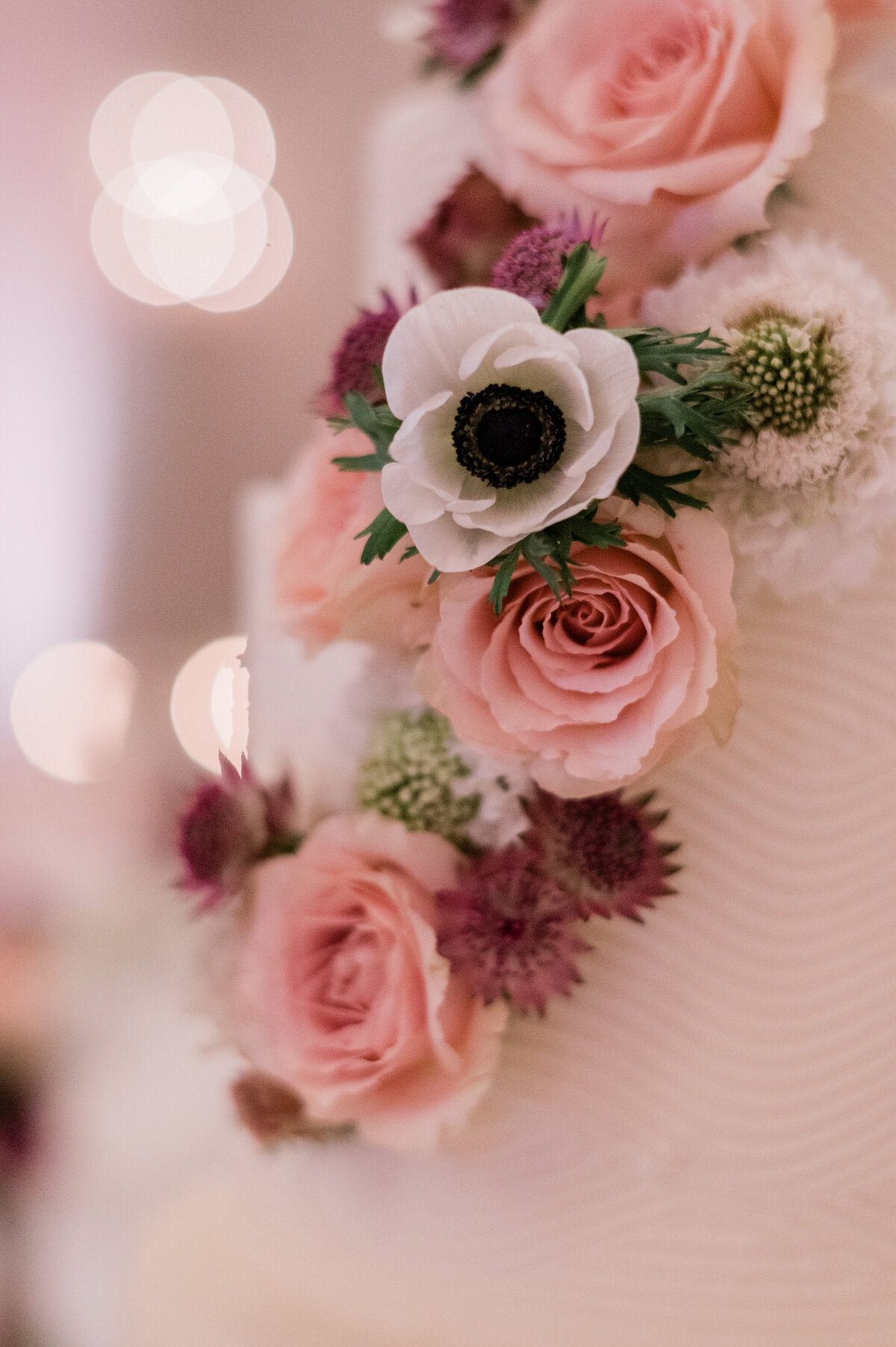 Pink cake floral arrangement 