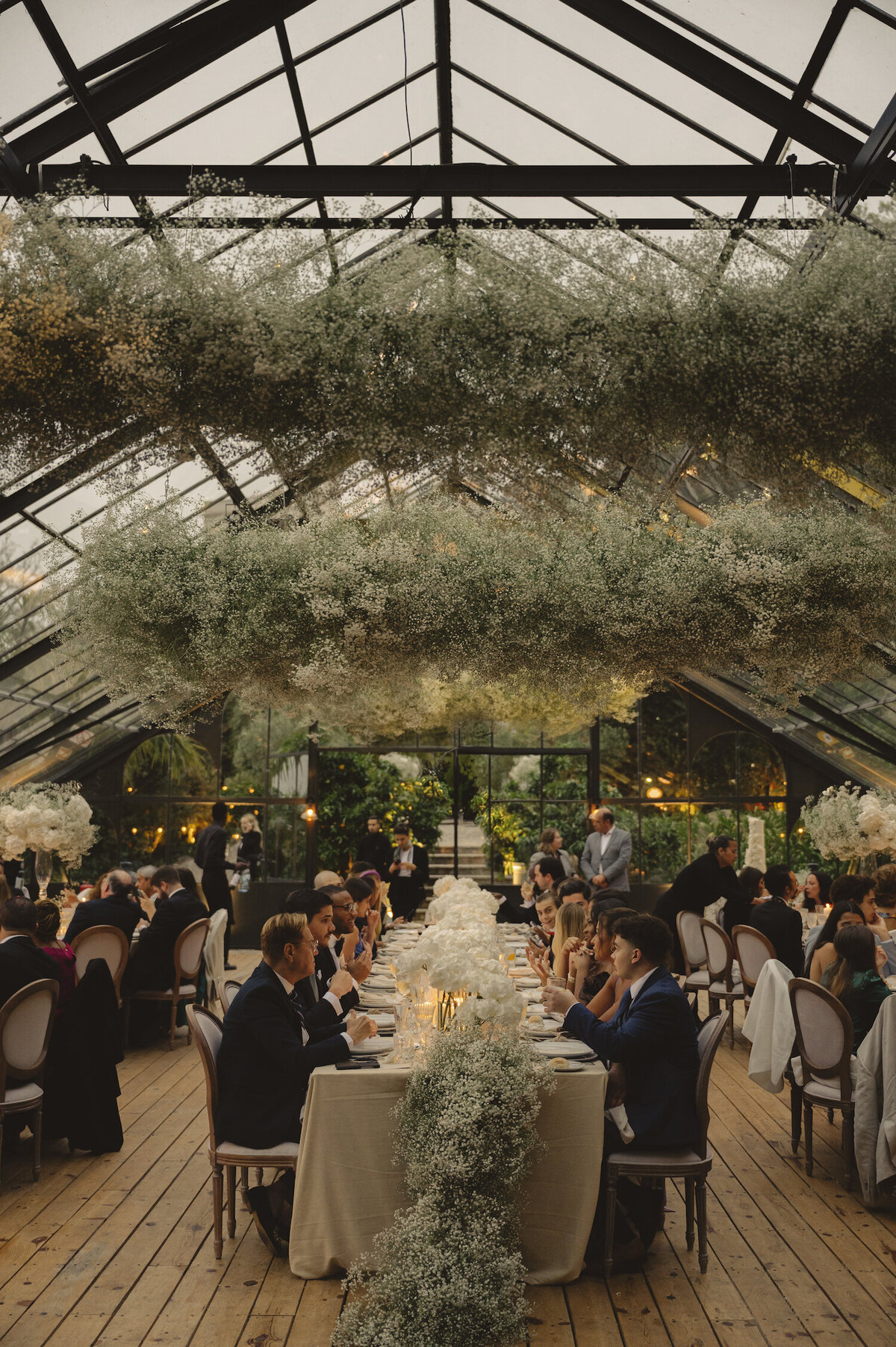 The beautifully decorated destination wedding reception in Quinta da Bellavista greenhouse