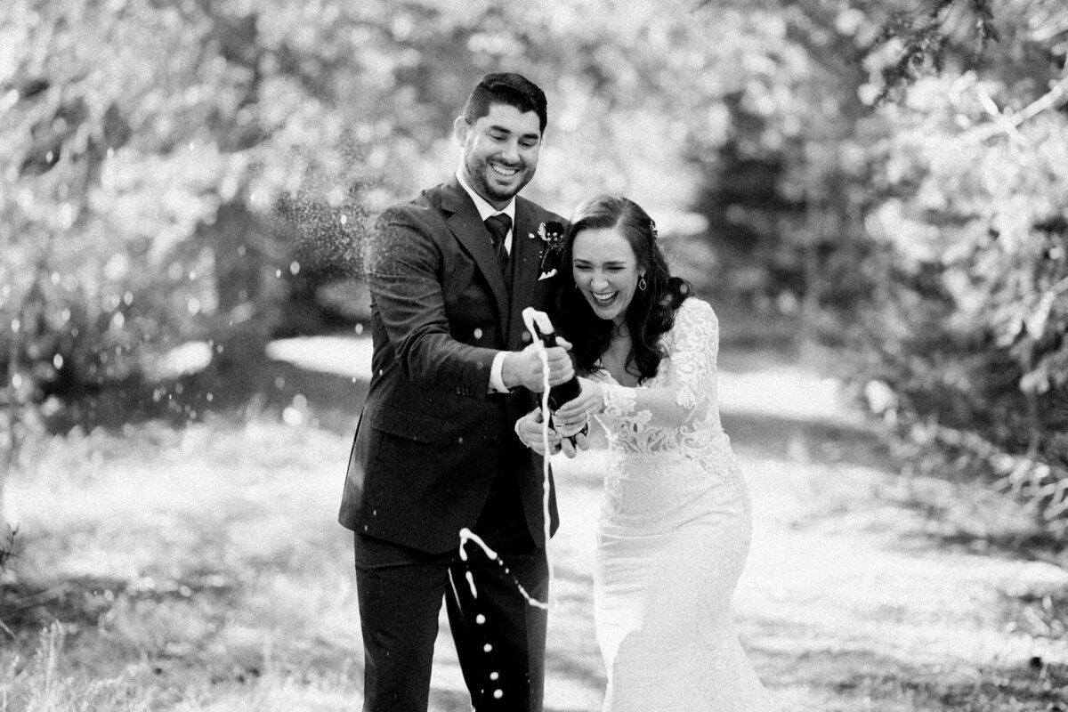 Gorgeous couple getting married in Houston enjoying a wedding video to treasure their memories forever