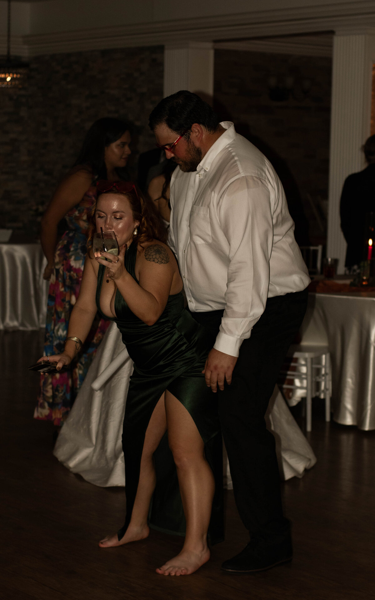 candid funny wedding dance floor photo