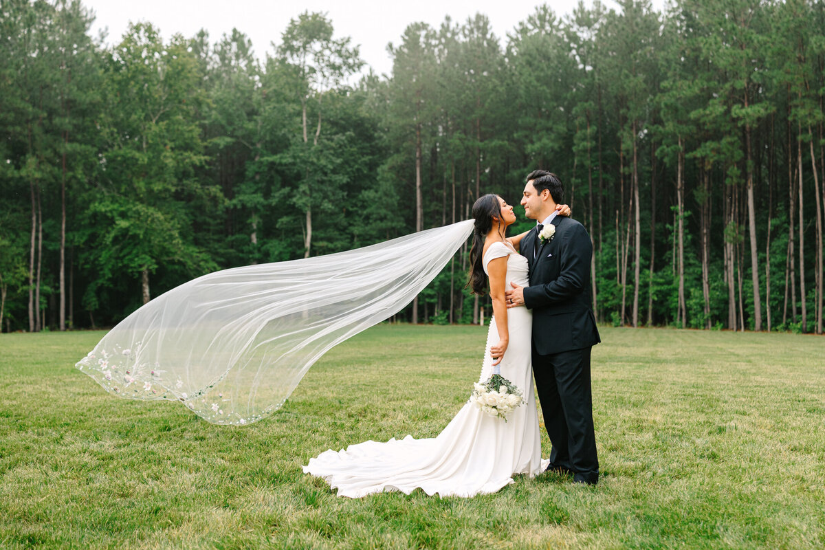The Maine of Williamsburg Bride and Groom Dramatic Veil Photo