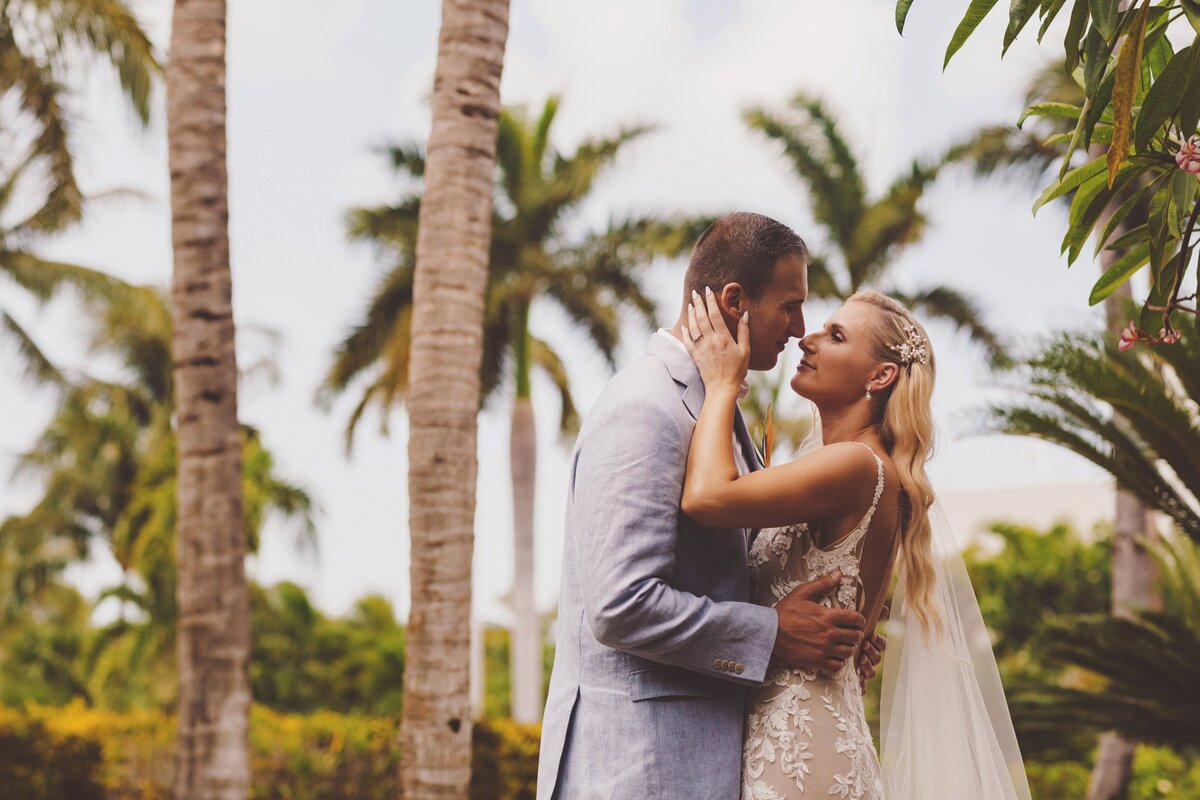 Bride and groom about to kiss before wedding in Cancun