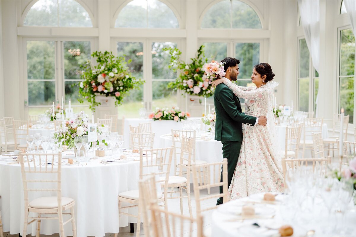 Bride and Groom in Orangery of Clevedon Hall 