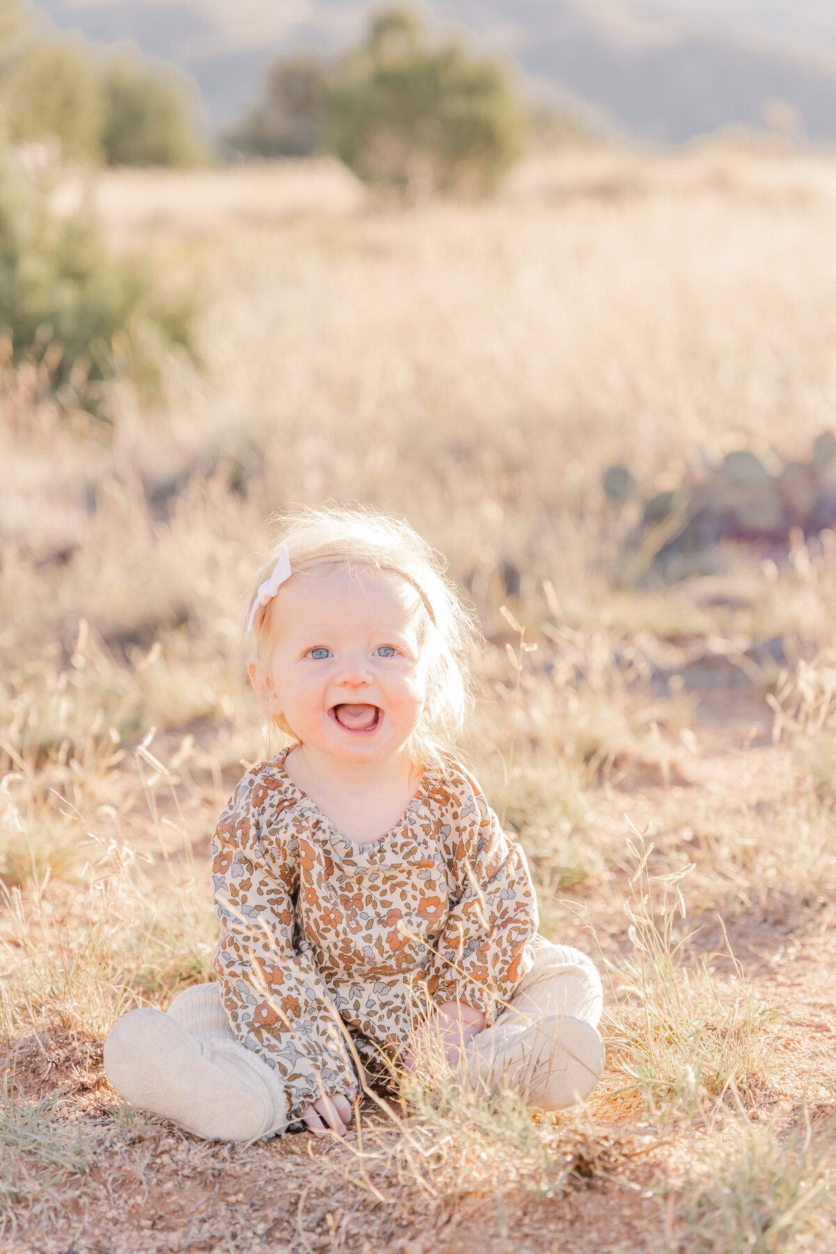 Baby girl laughing for Erin Thompson Photography