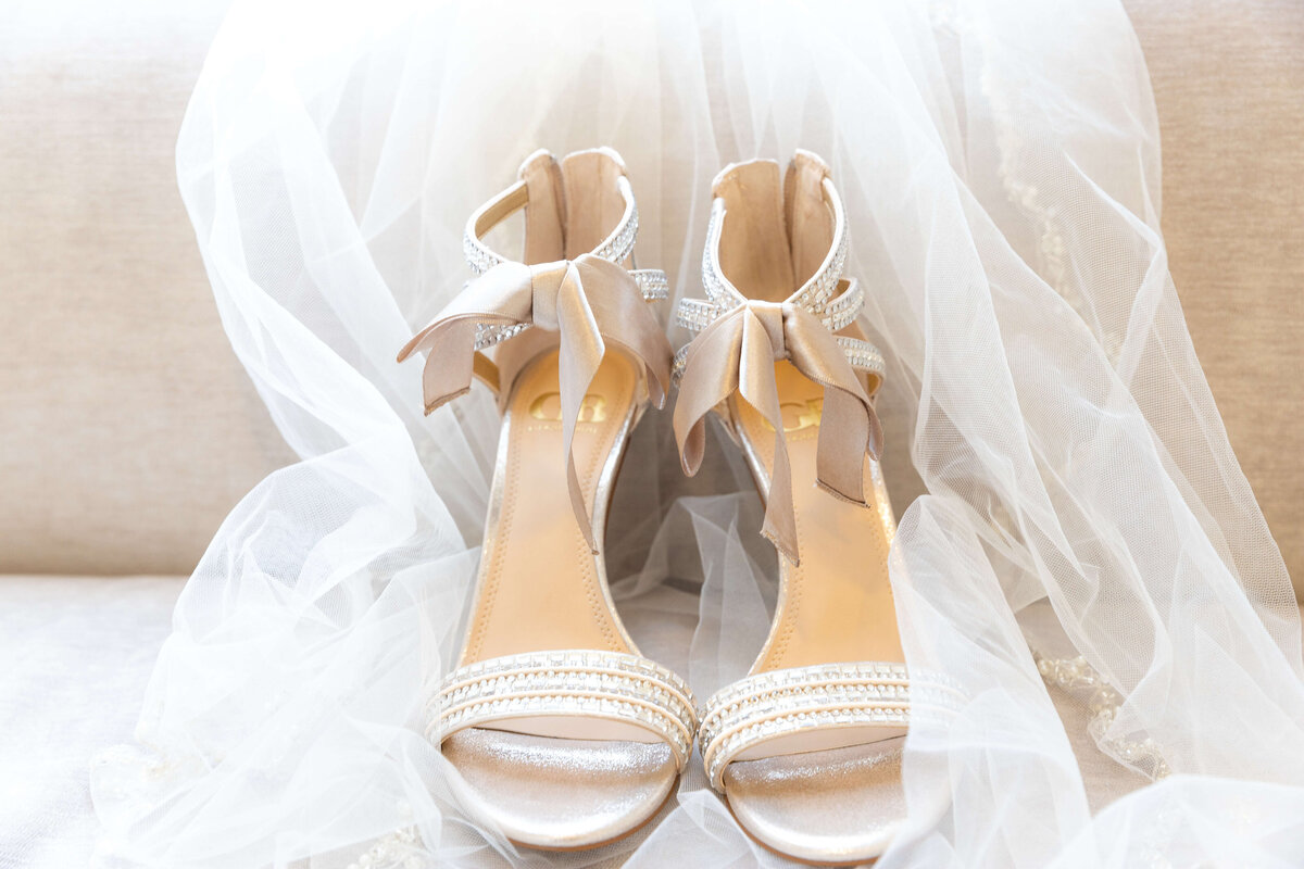 Wedding shoes on a wedding veil