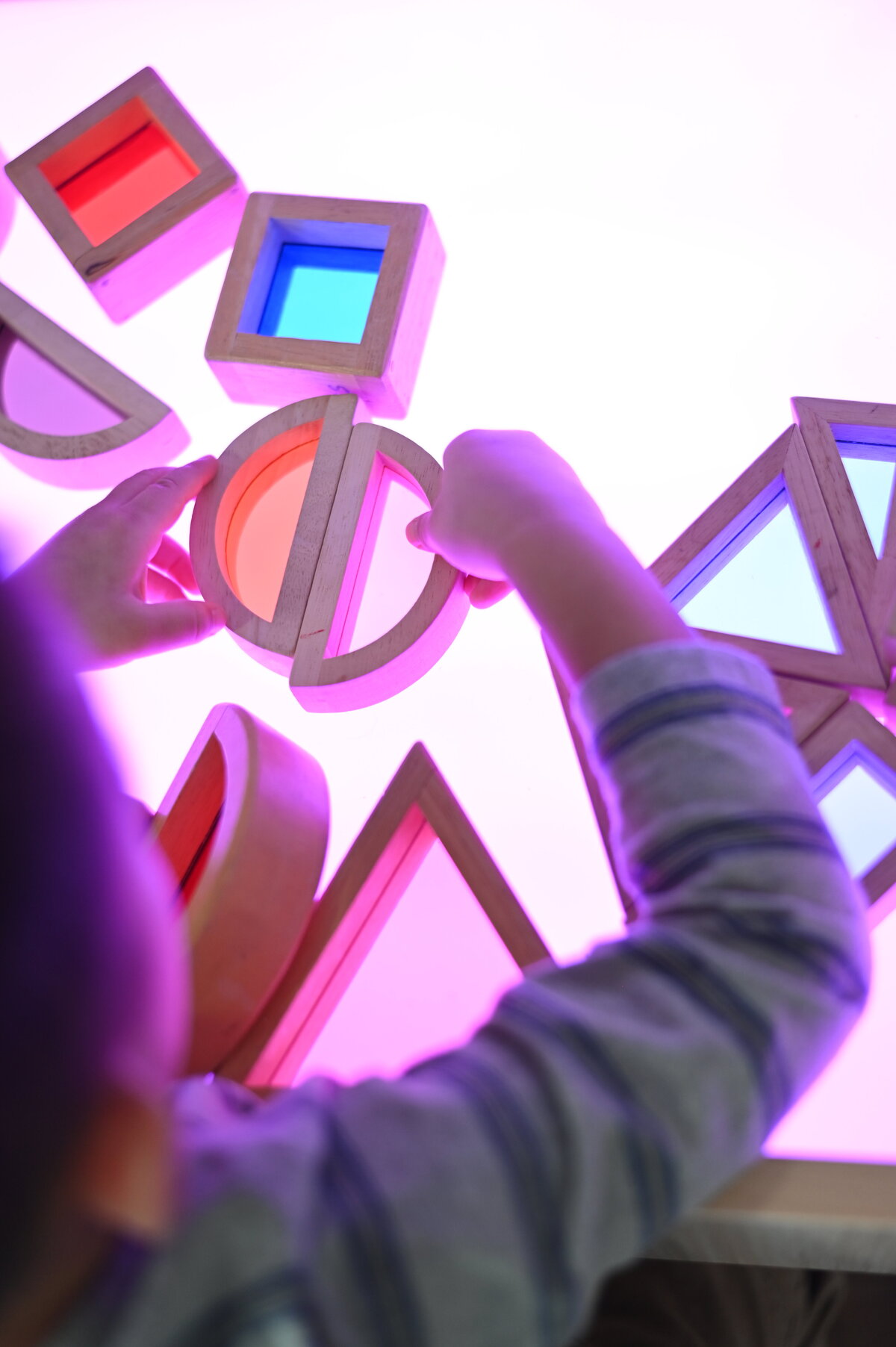 Student playing at House of Parker Preschool Gorham Maine where every detail is thoughtfully designed to create a warm, welcoming space for children to explore, learn, and grow with comfort and confidence.