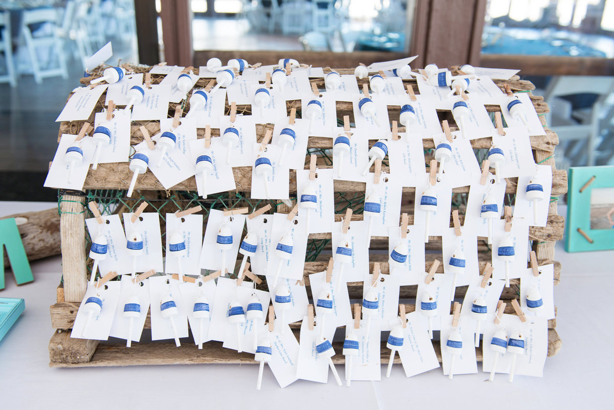 photo of table seating cards on treasure chest from wedding reception at Pavilion at Sunken Meadow