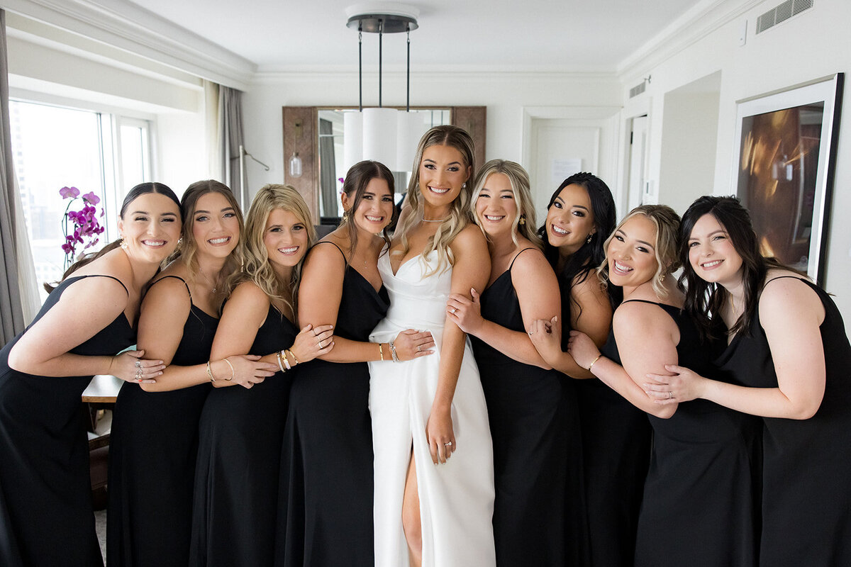 Bride-with-bridesmaids-black-dress-four-seasons-hotel-HBIC-Weddings