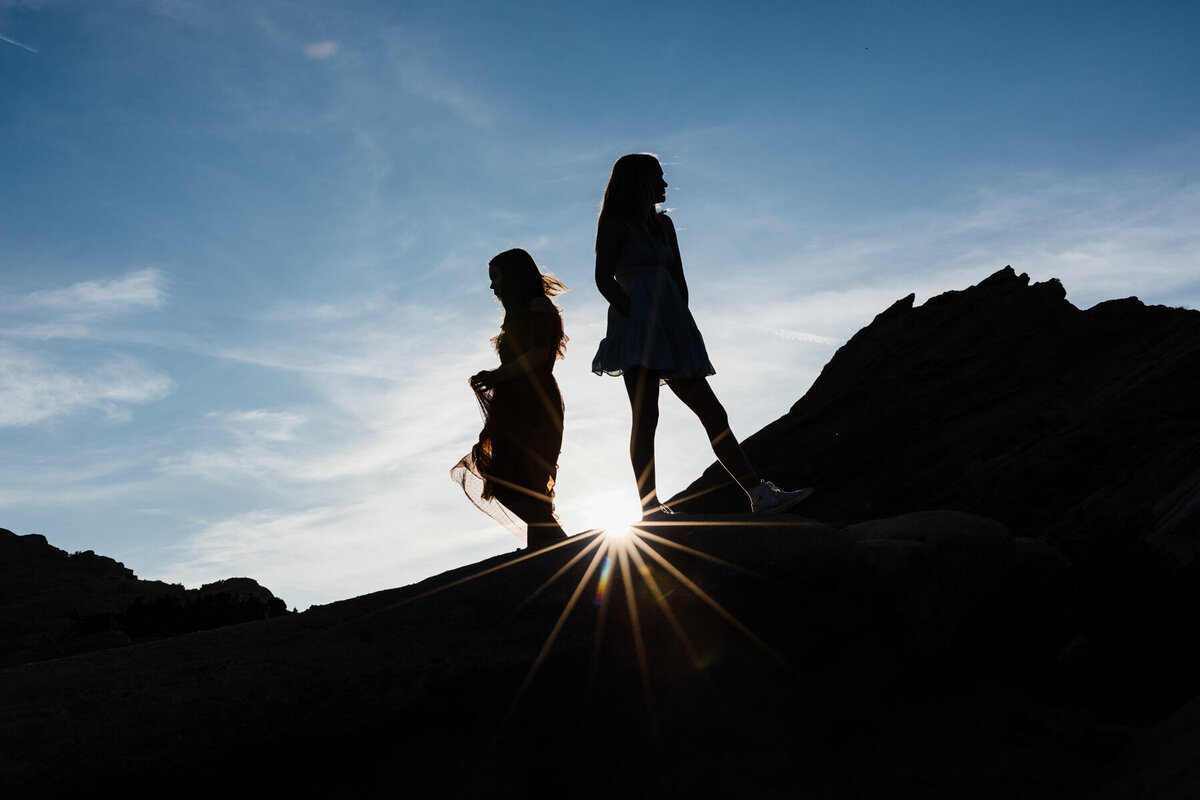 girls-silhouette-with-a-sunburst-at-Vasquez_rocks