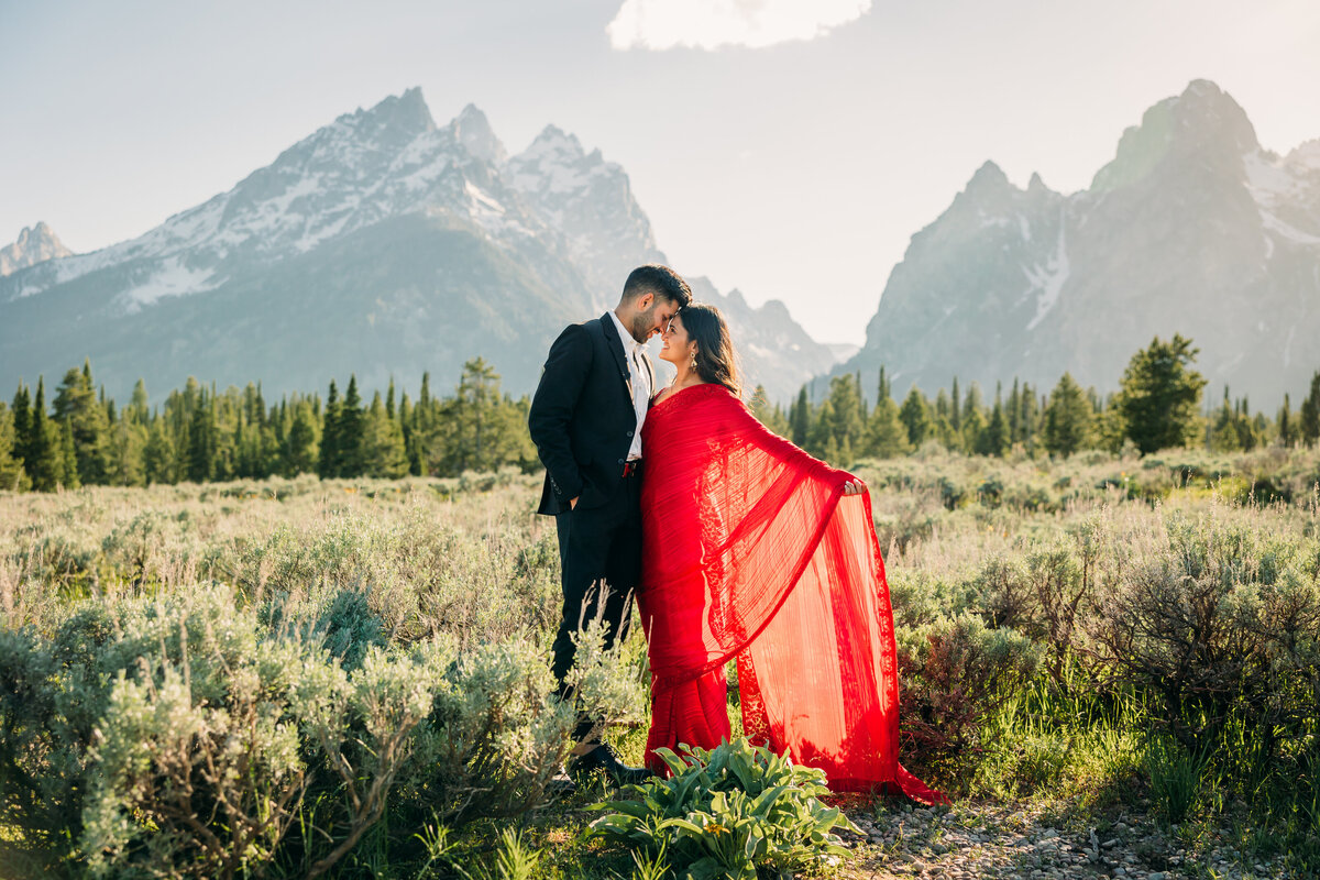 Cascade Canyon Turnout photo session in Grand Teton National Park with red dress and bright summer day