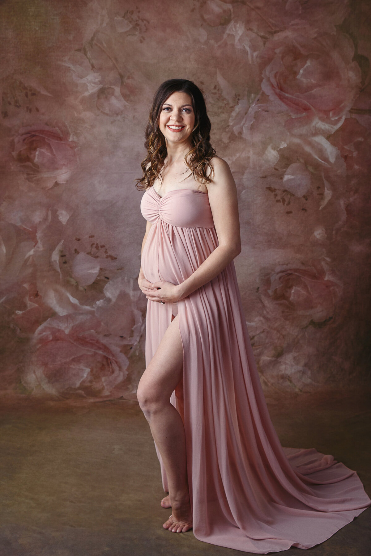 Full lenth maternity portrait photographed in studio in Orfordville, Wisconsin