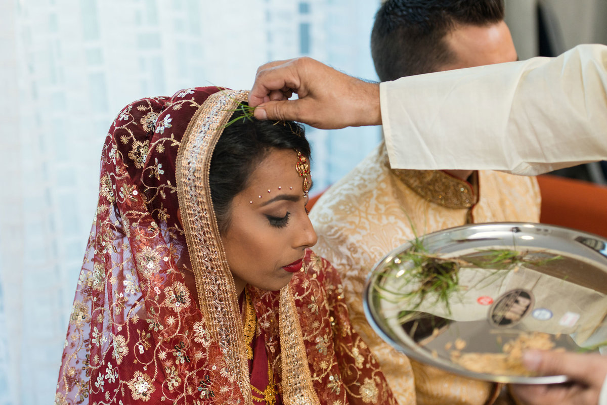 bride during ceremony at Huntington Hilton