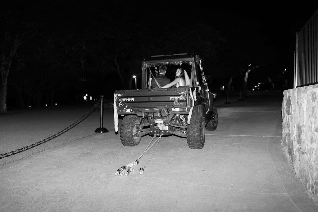 bride and groom in buggy car