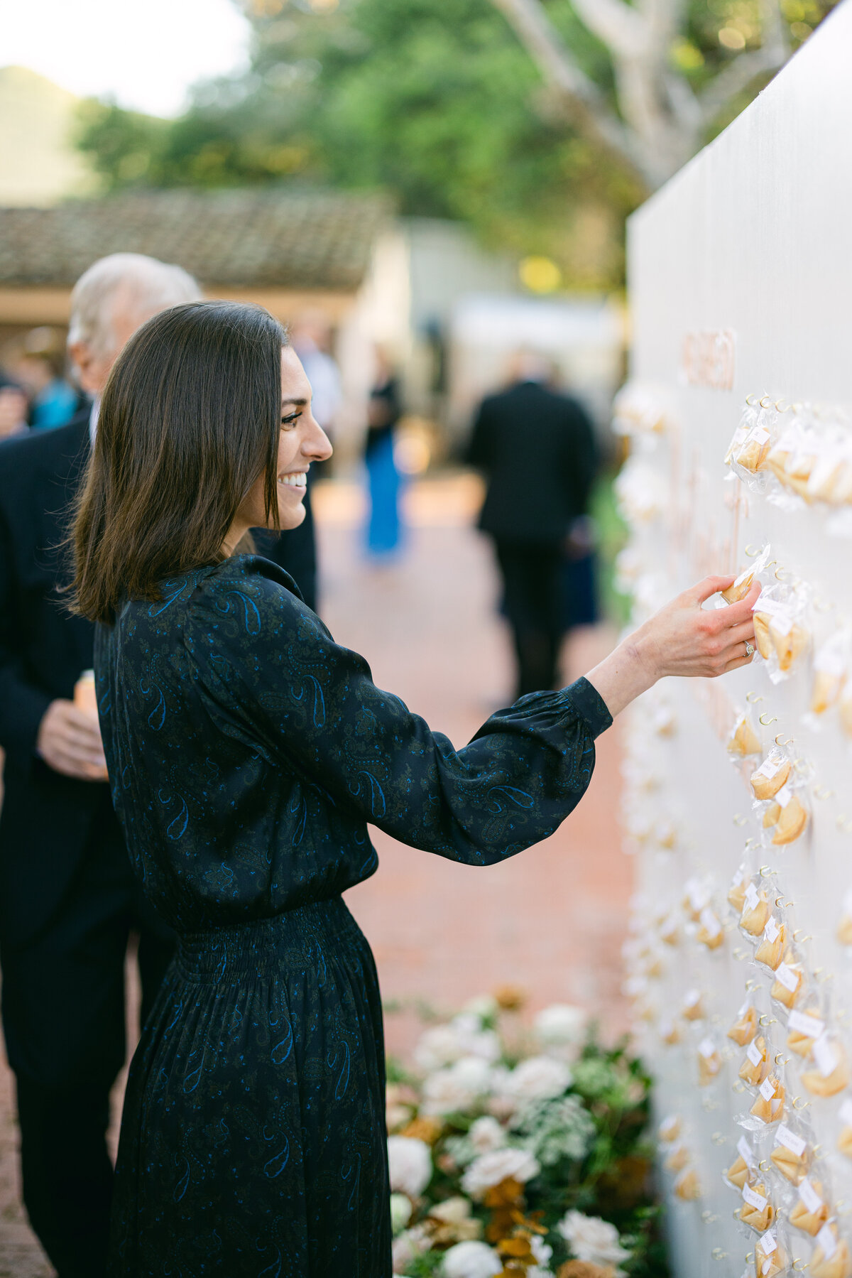 Guests enjoying the escort card display