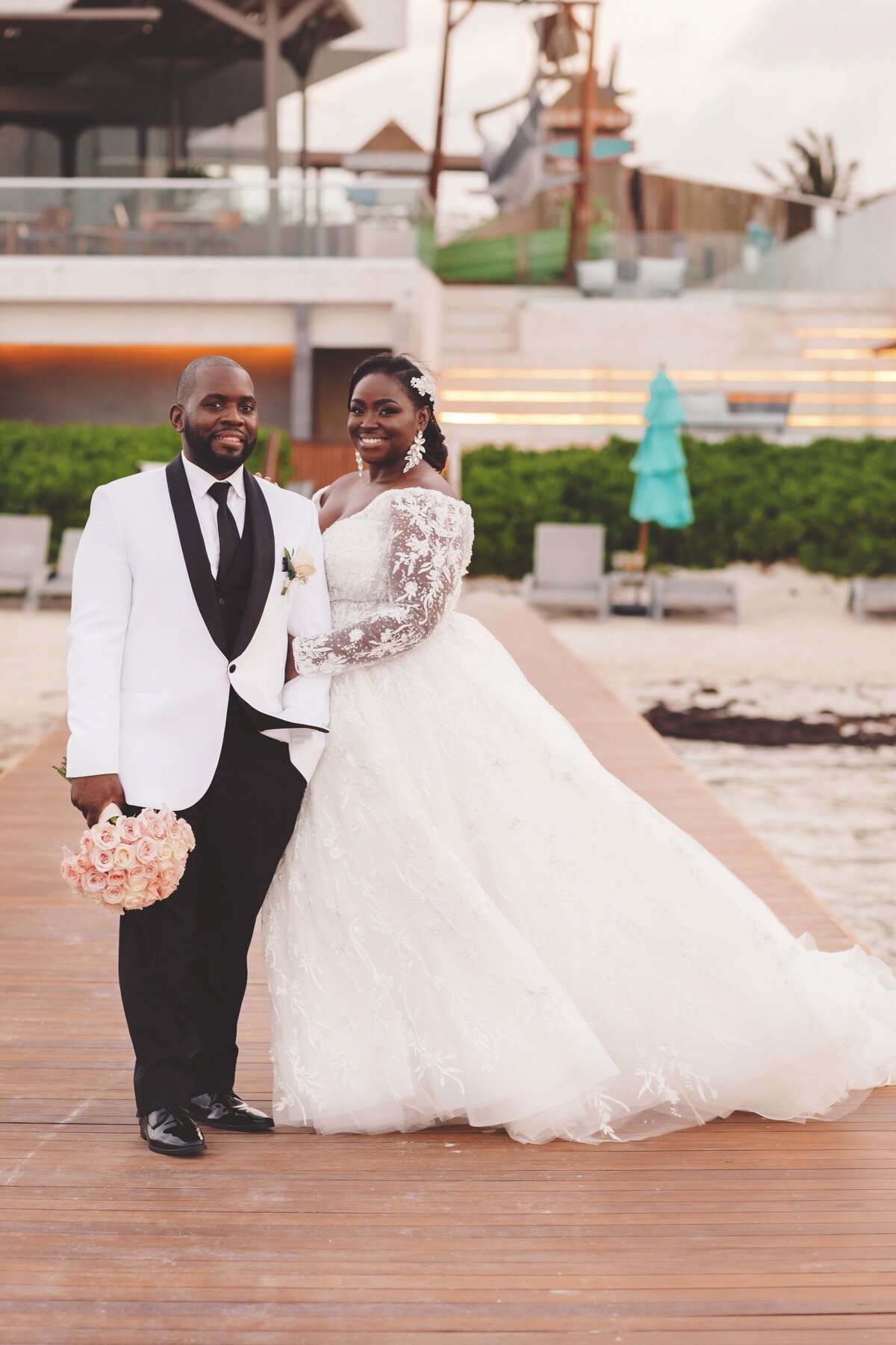 Editorial portrait of bride and groom at wedding in Cancun