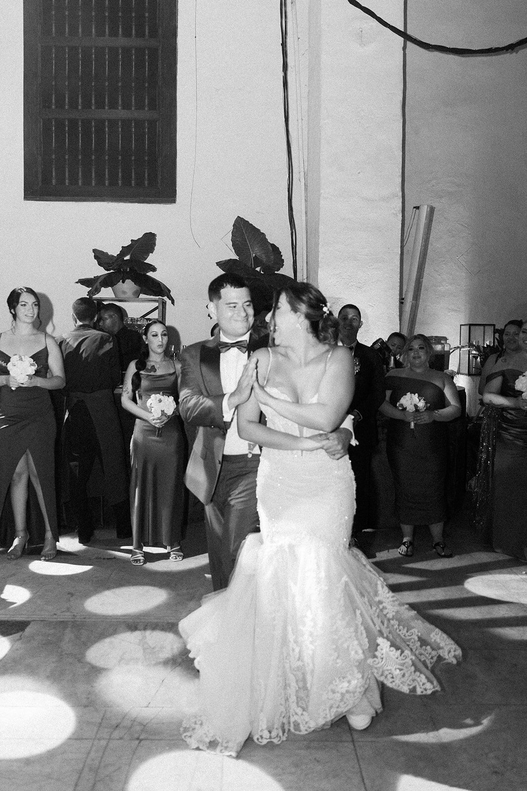 A timeless black-and-white image of Victoria and Daniel sharing their first dance as husband and wife in Cartagena Colombia.