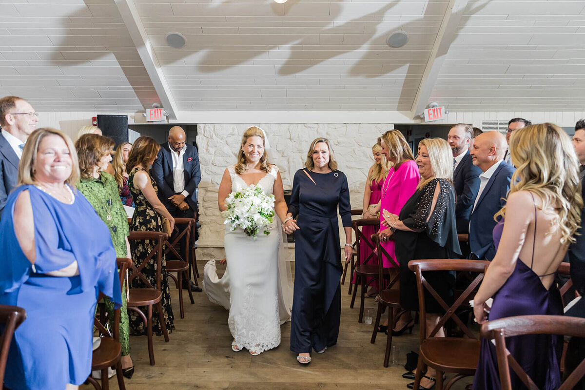 Bride walking down the aisle at Long Island wedding