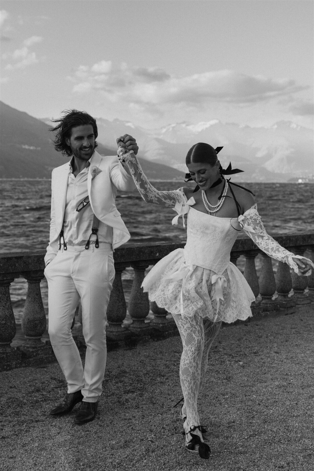 bride and groom having fun after eloping in bellagio lake como