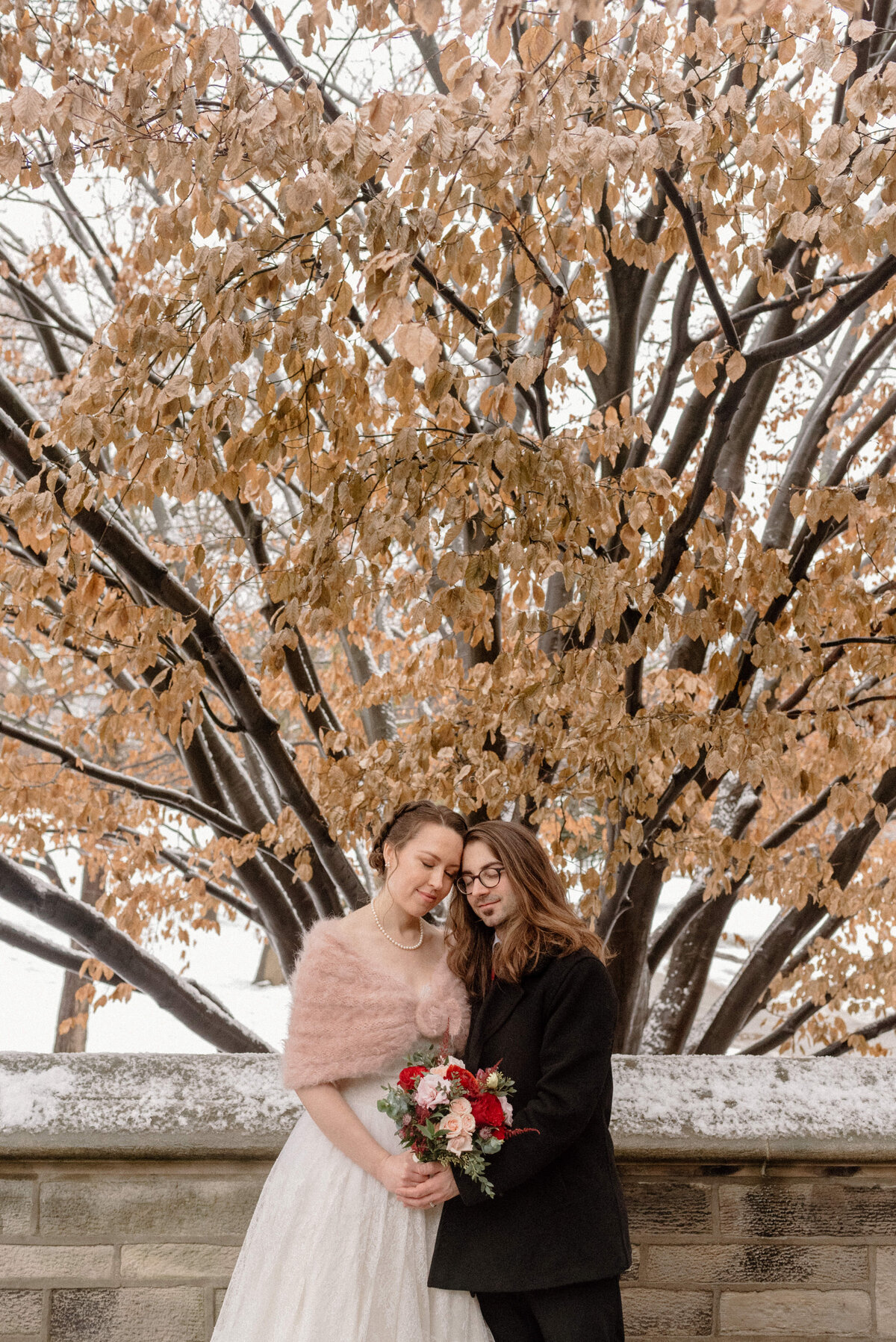 toronto ontario hart house university of toronto bride and groom share a quiet moment in the winter weather