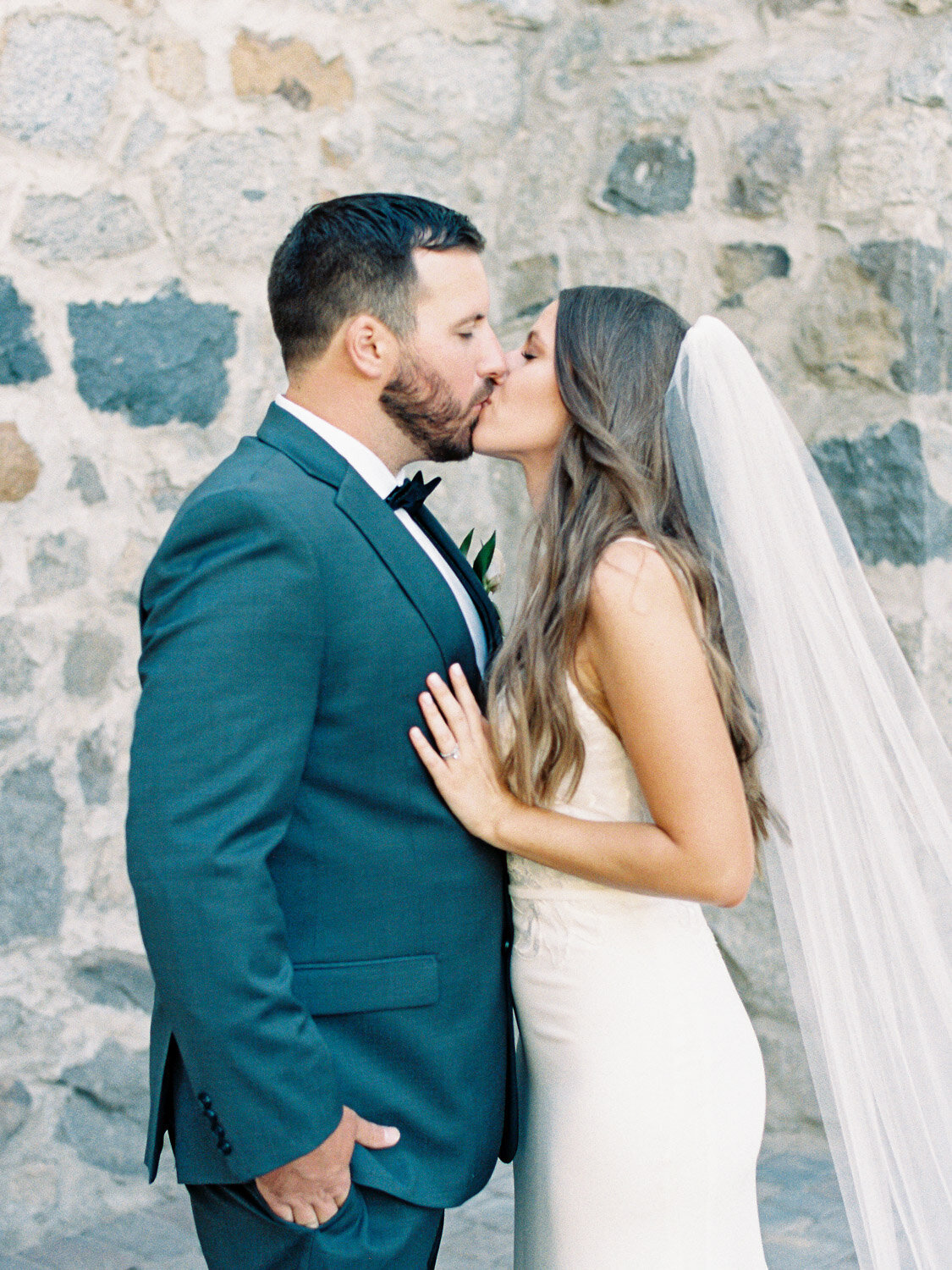 Bride and groom kissing in lake tahoe wedding