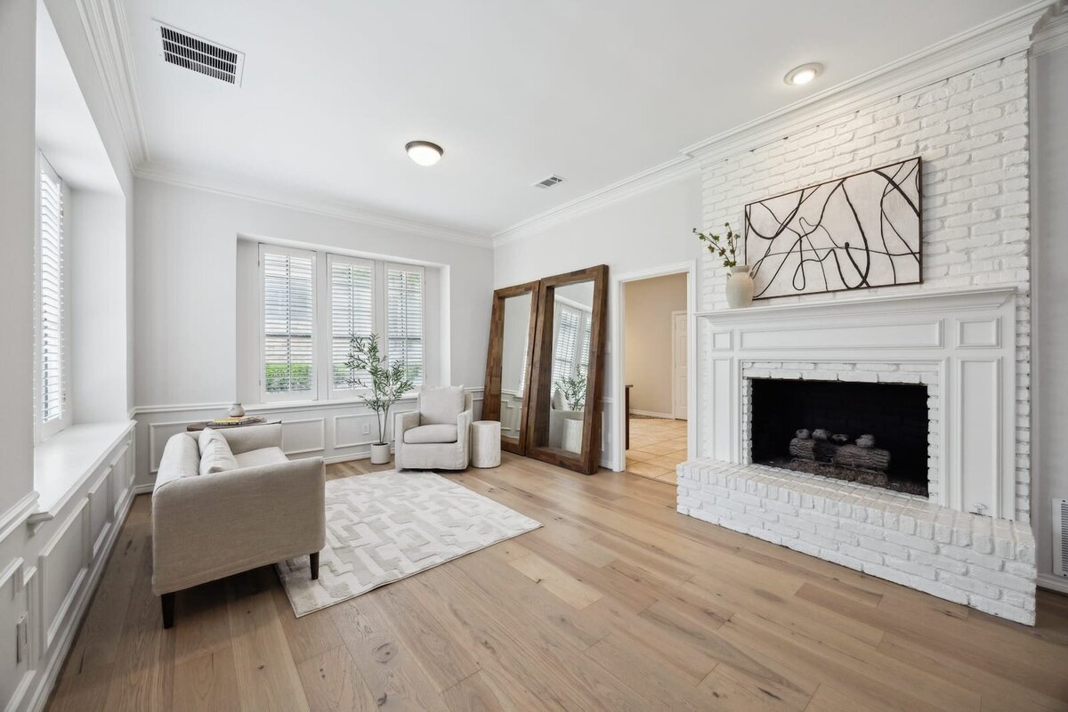17828_cedar_creek_canyon_dr_dallas_tx_primary_bedroom_sitting_area_with_fireplace_-_haven_realty_group