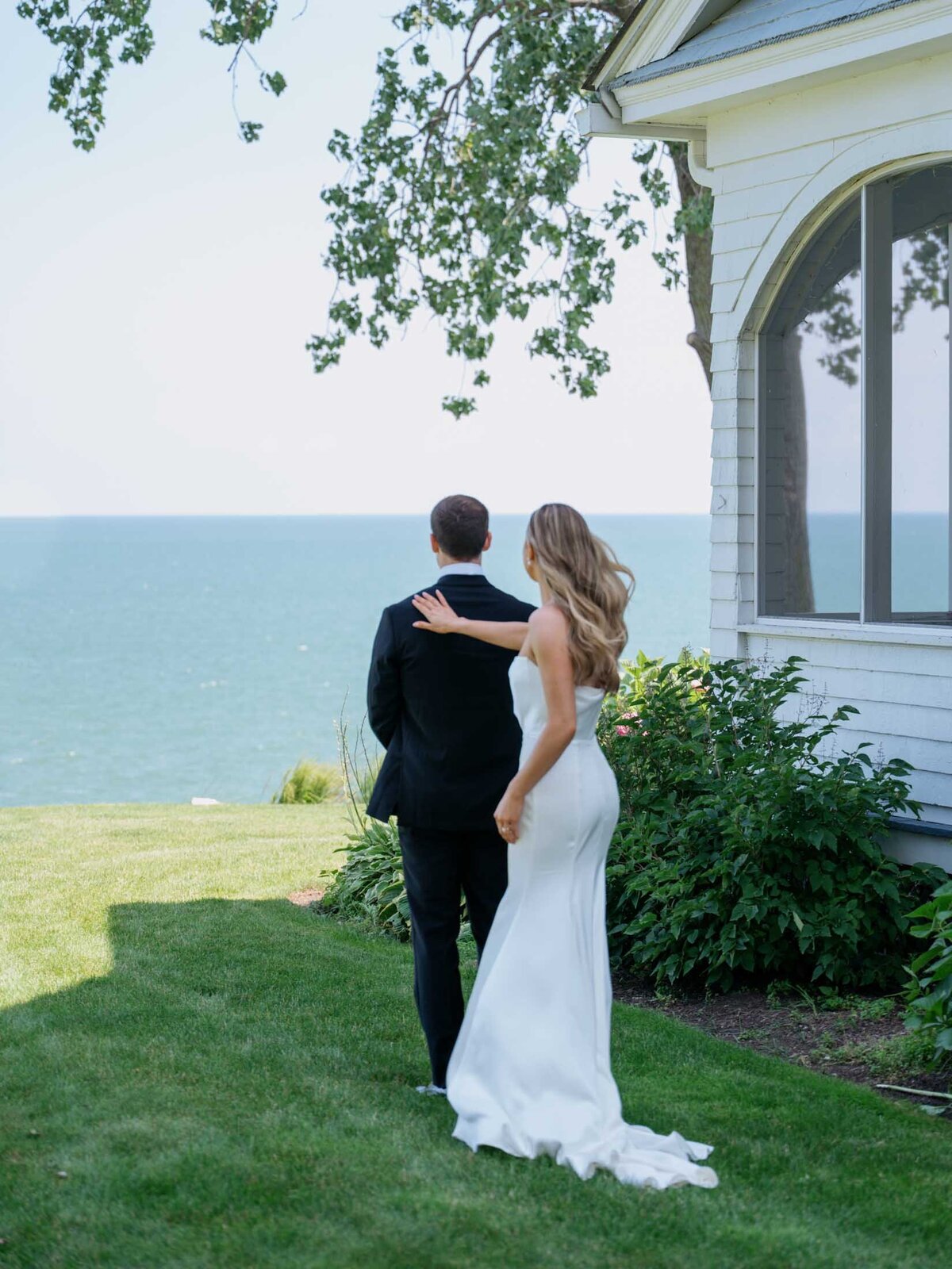 Bride and groom by Lake Erie in Cleveland before their wedding ceremony