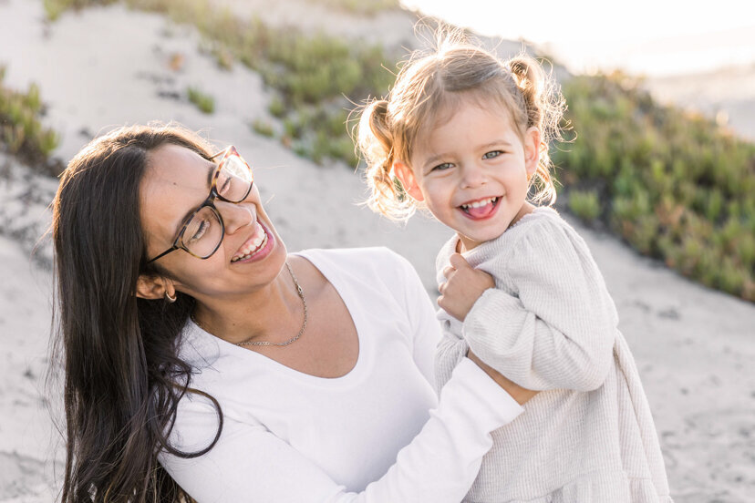 mother-and-daughter-laughing-in-coronado-sand-dunes