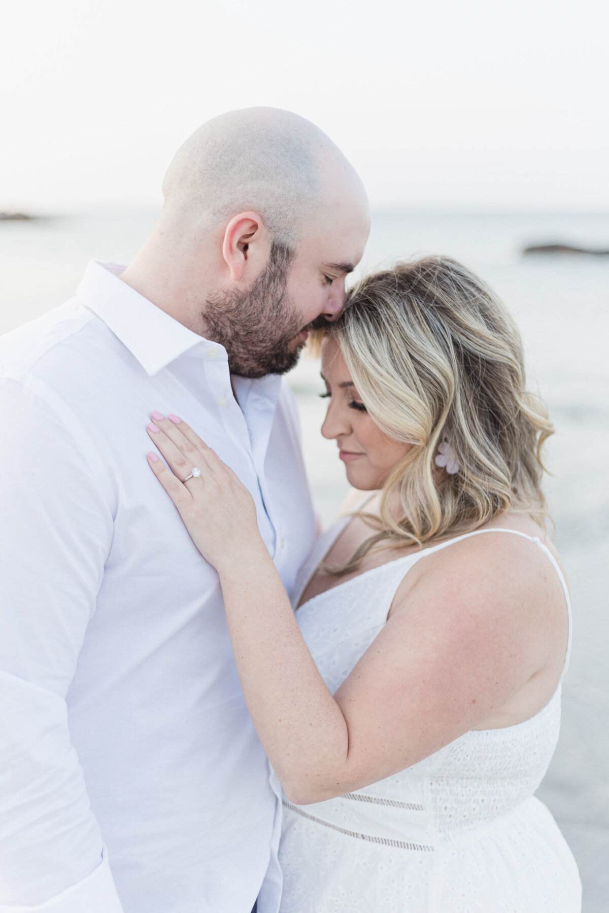 A sweet portrait of an engaged couple in love during their engagement session