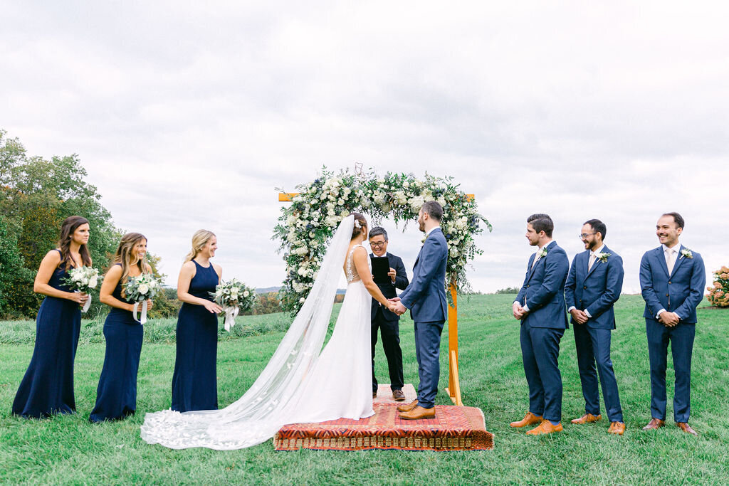 outdoor-wedding-ceremony-floral-arch
