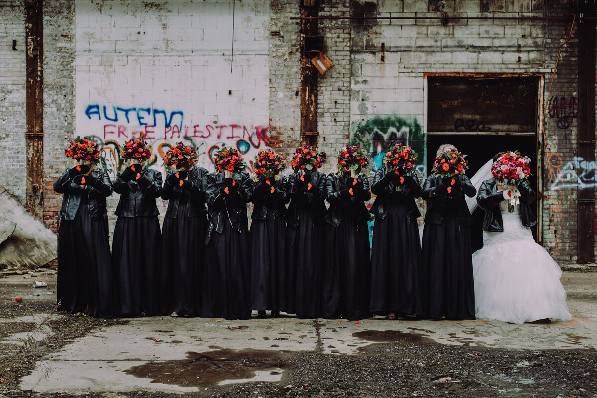 Grunge bridal party photo at abandoned cleveland factory.