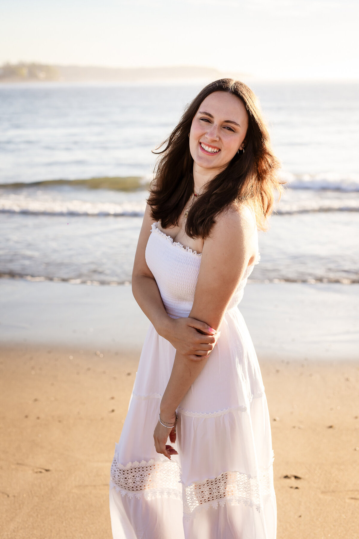 High school senior smiling at Short Sands beach in York ME by nh senior photographer Lisa Smith Photography