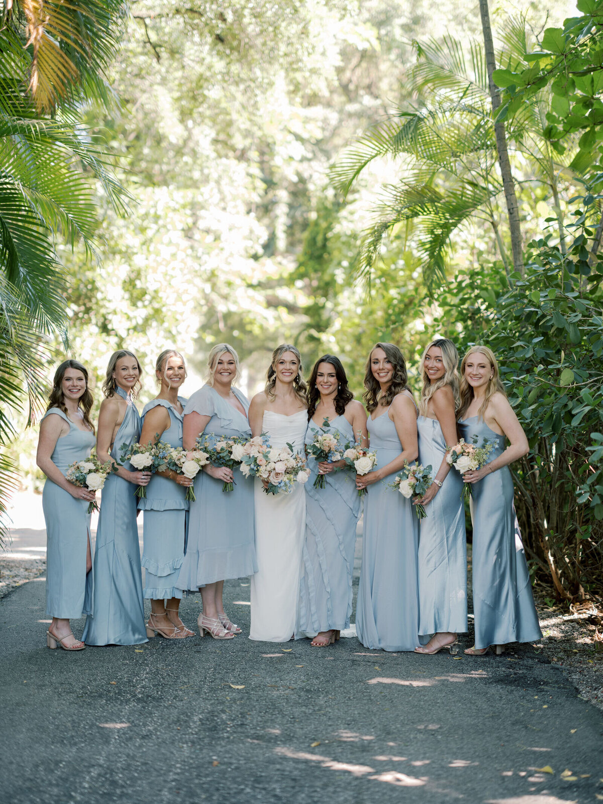 bride-bridesmaids-pose-trees-7HM-W