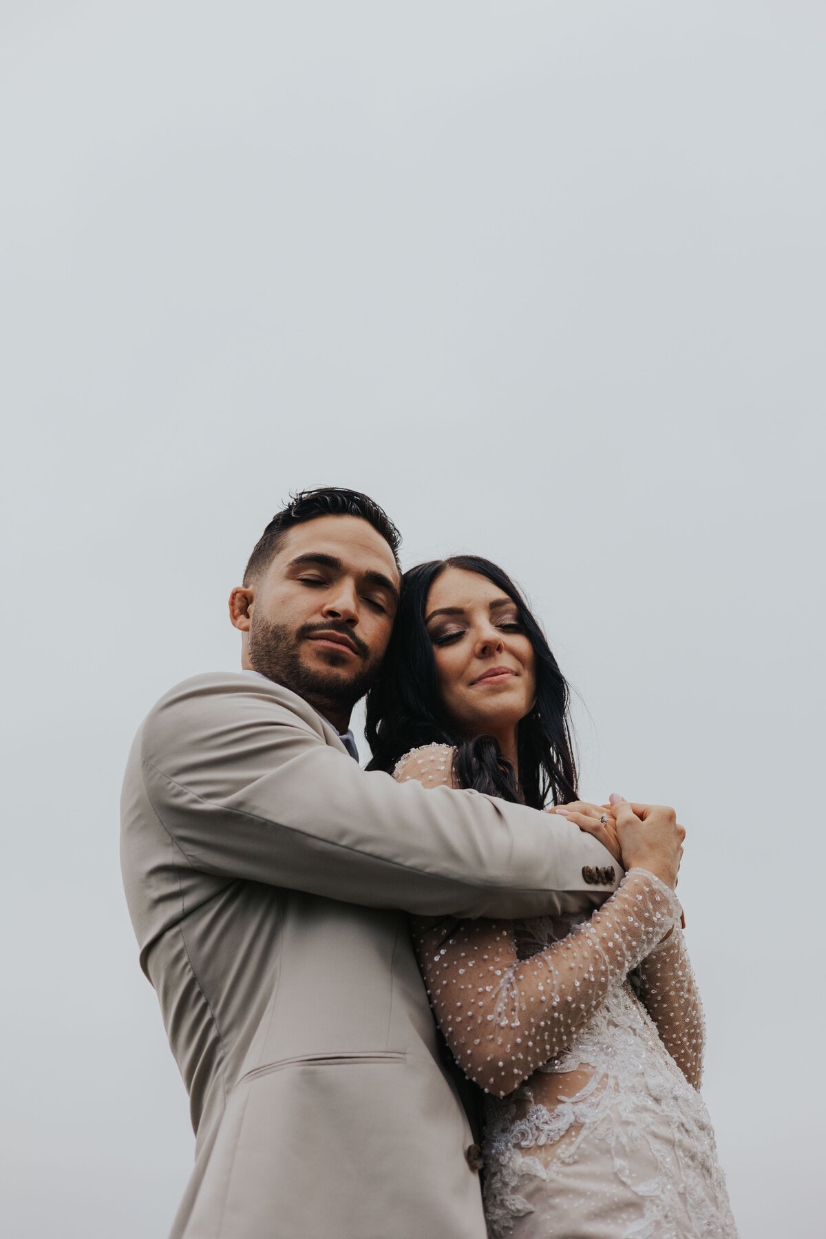 couple hugging on their wedding day