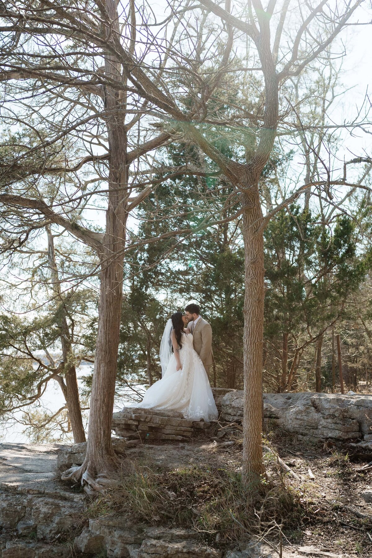 couple sharing a sweet moment at elopement at long hunter state park