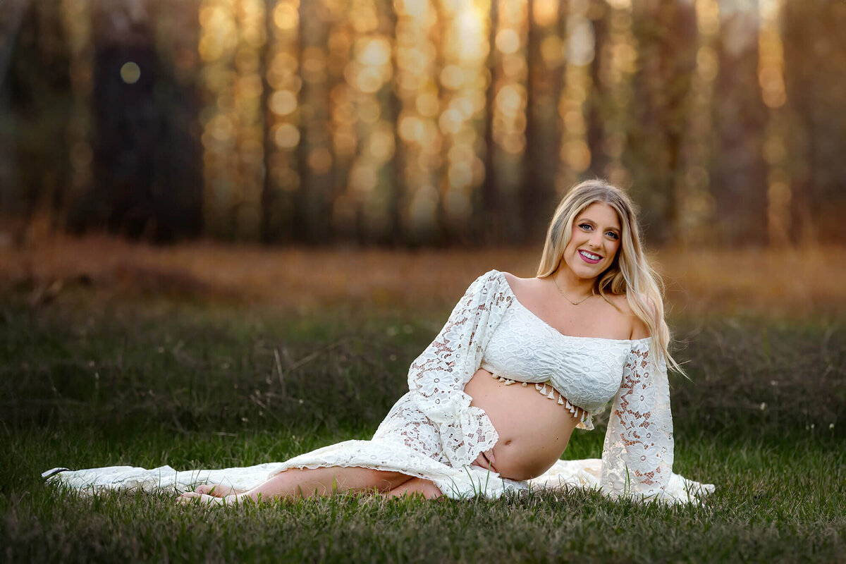 Expectant momma showing her belly during golden hour in her Houston Maternity Photography session.