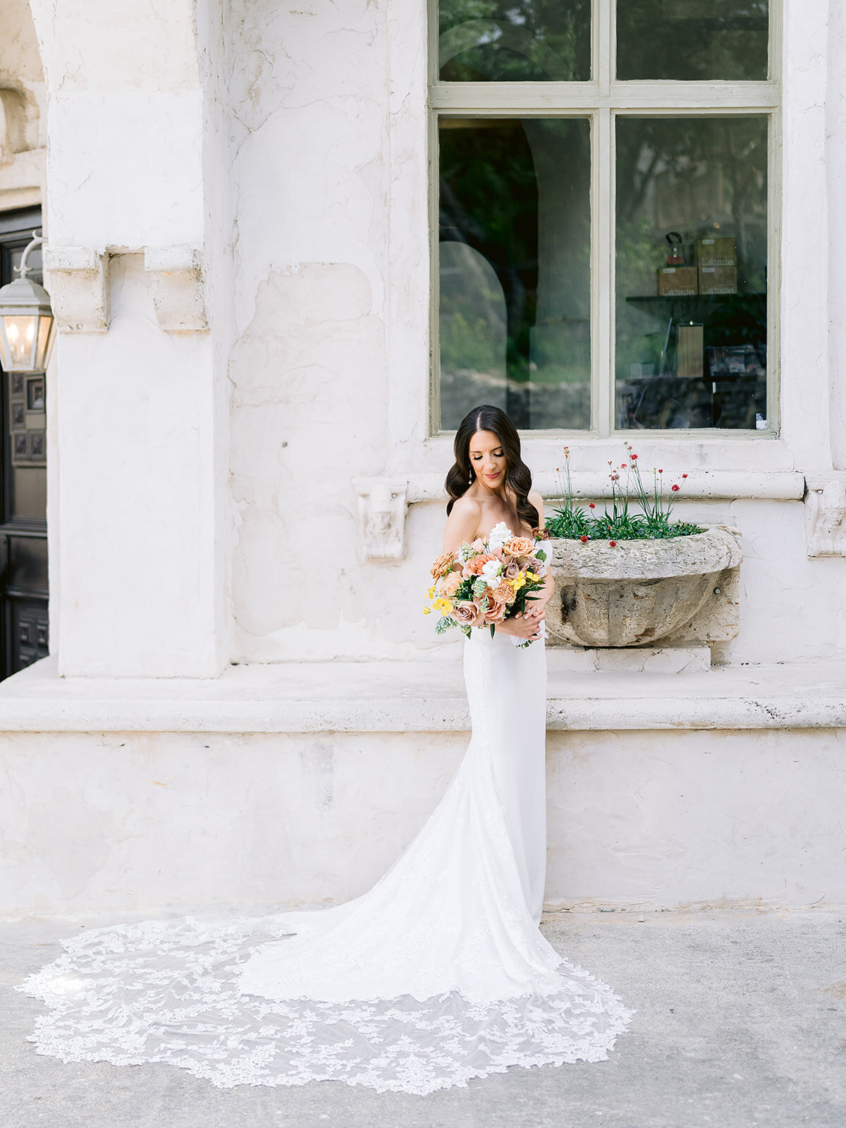 A bridal portrait in front of the Italy-inspired wedding venue in Austin