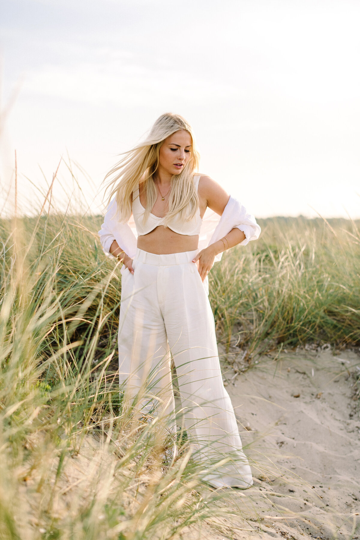 white linen pants outfit for beach engagement session mallorca