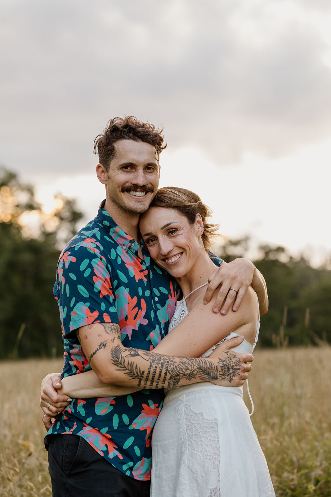 Newlyweds hugging and smiling together