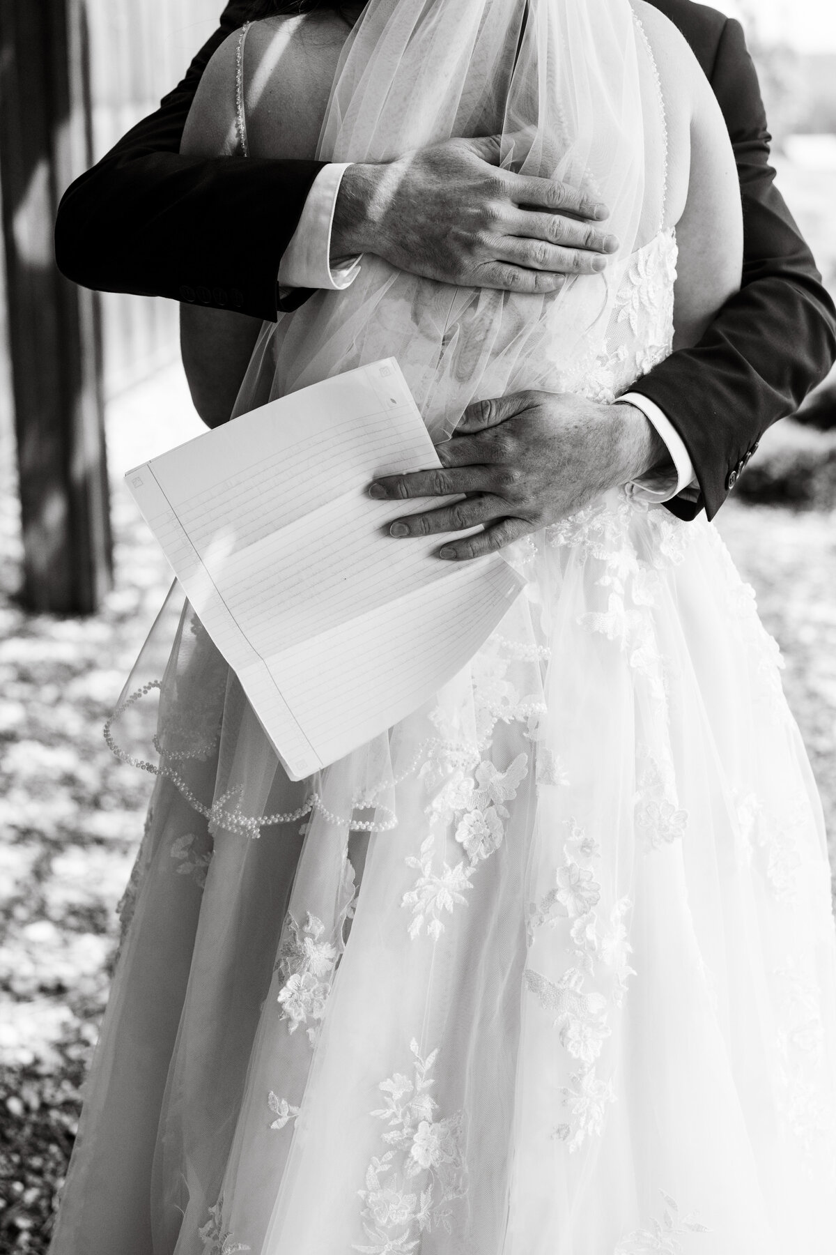 Bride and groom hugging at first look at an Idaho venue taken by Idaho wedding photographers.
