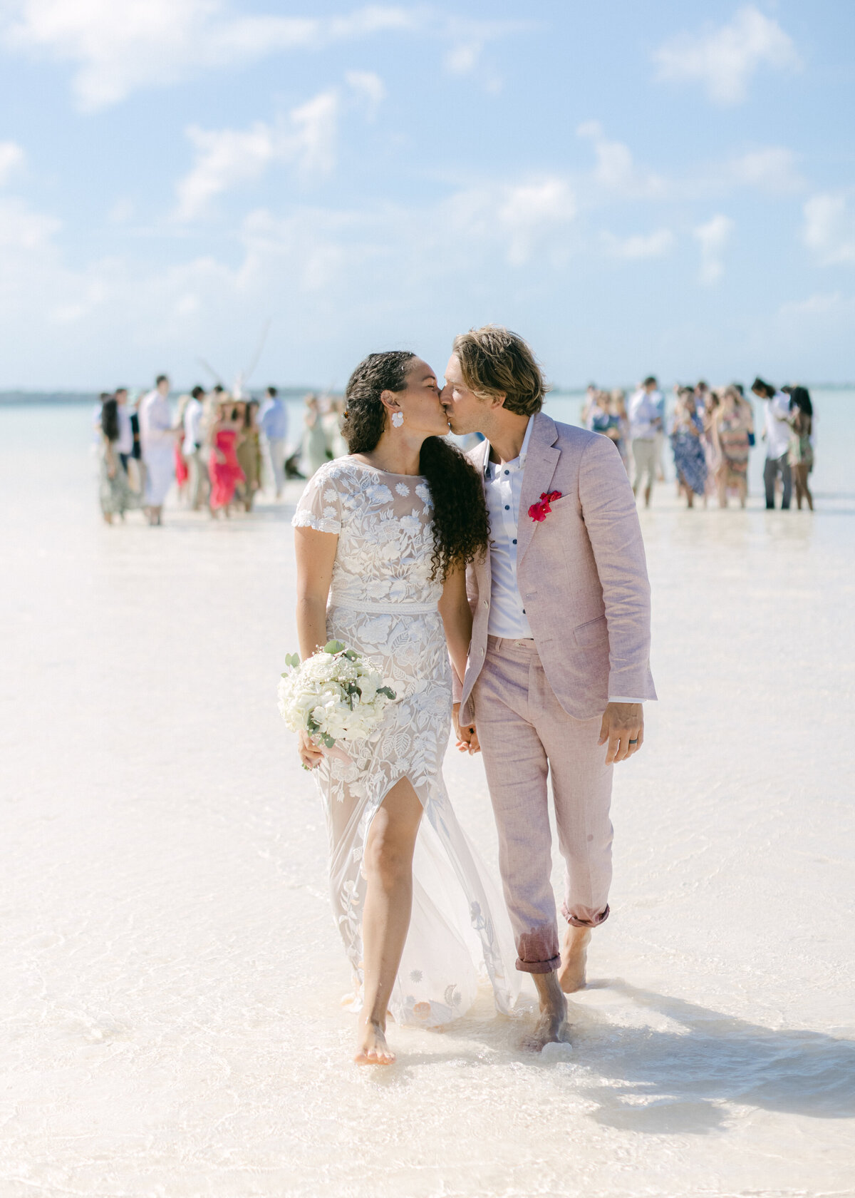 Bride and groom kissing Harbour Island.