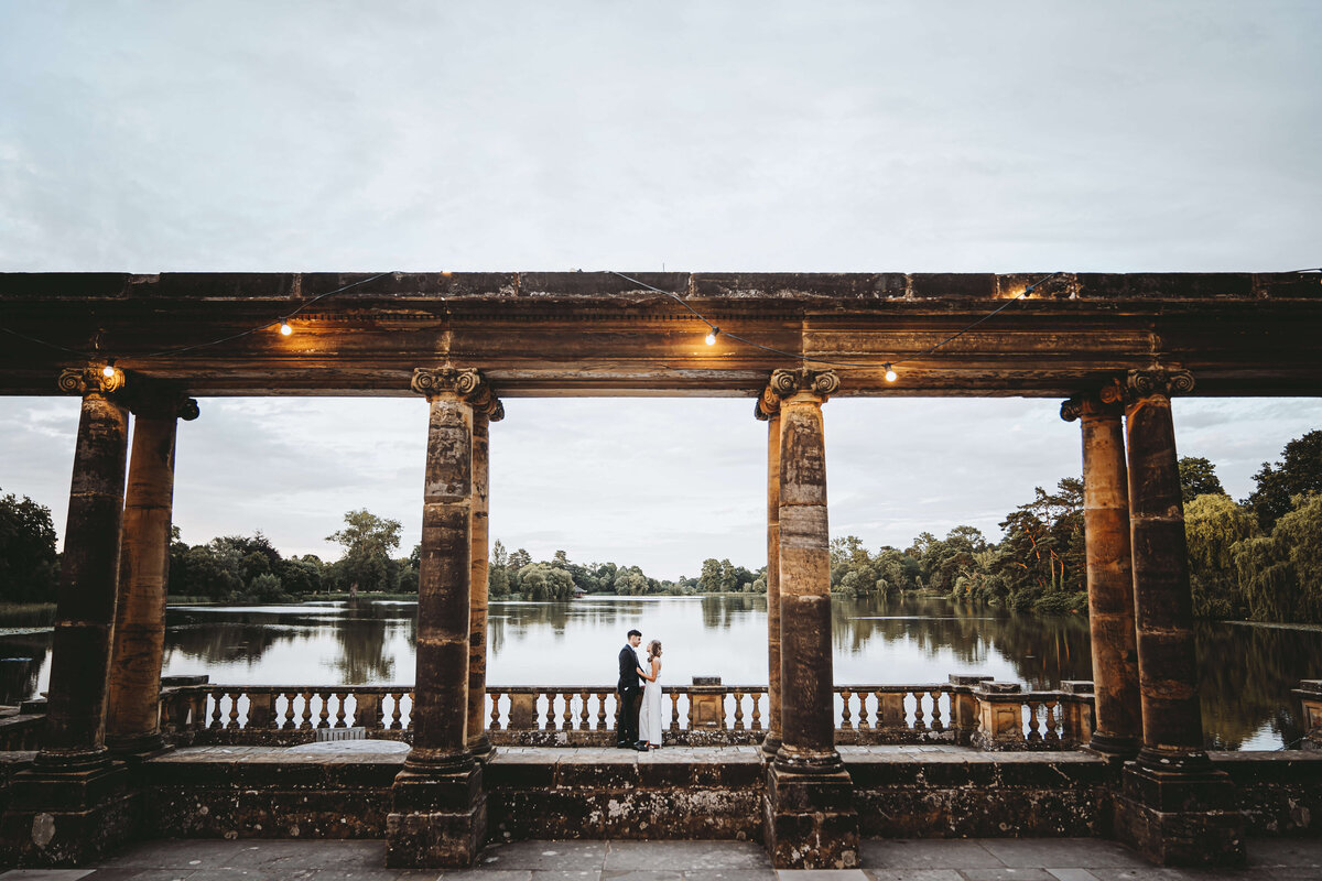 hever-castle-wedding-couple-golden-hour-lake