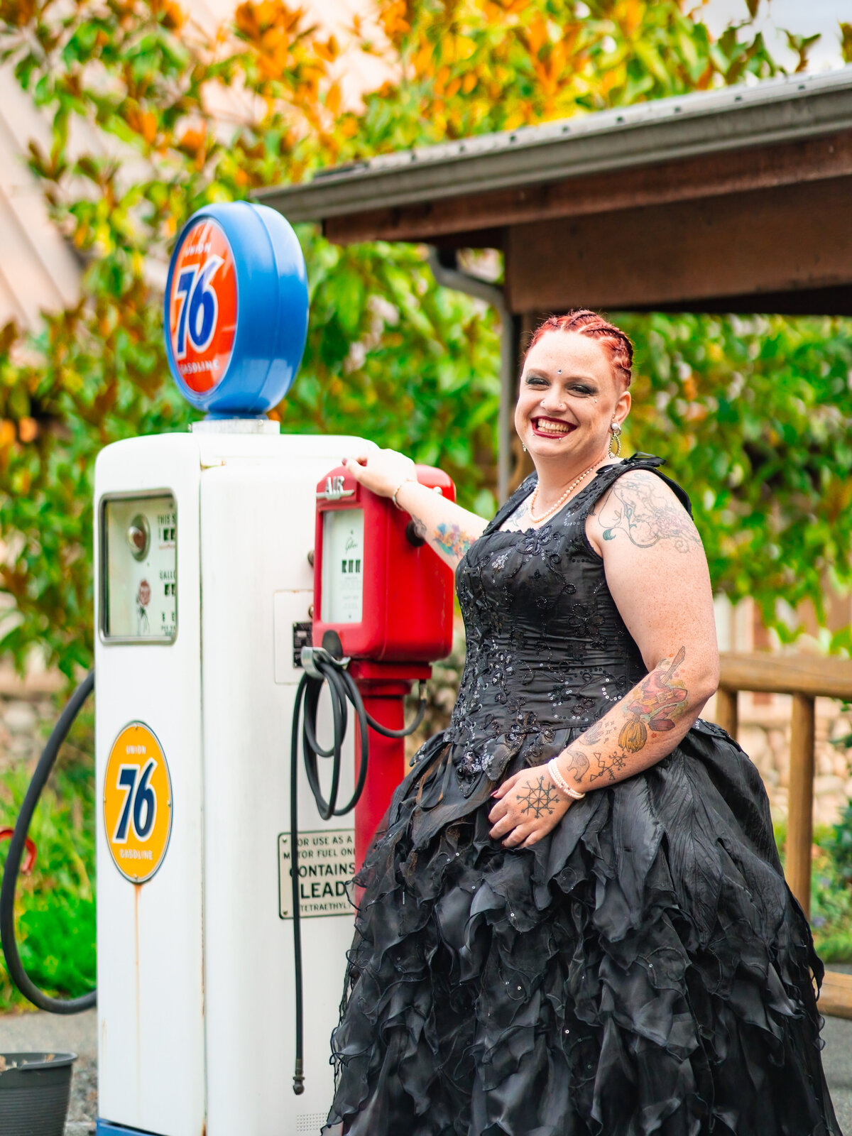 a bride in black dress at the gas station in the Bay Area