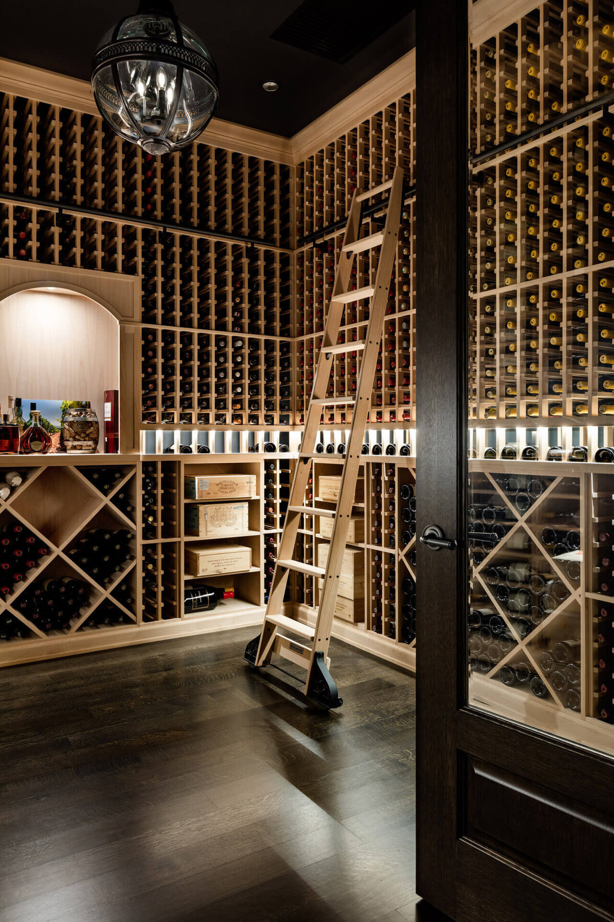 Wine-cellar-with-rolling-library-ladder