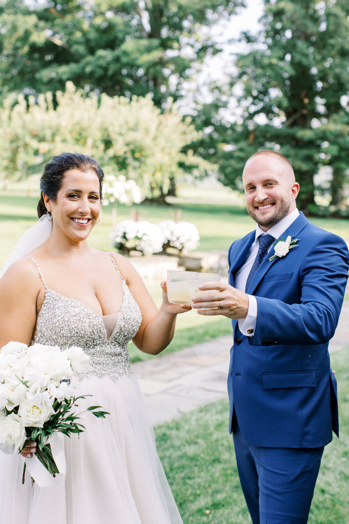 bride-and-groom-cheers-at-lion-rock-farm