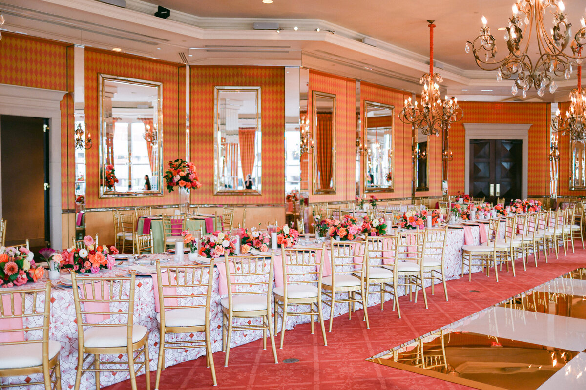 A wedding day photo of the reception hall and tables