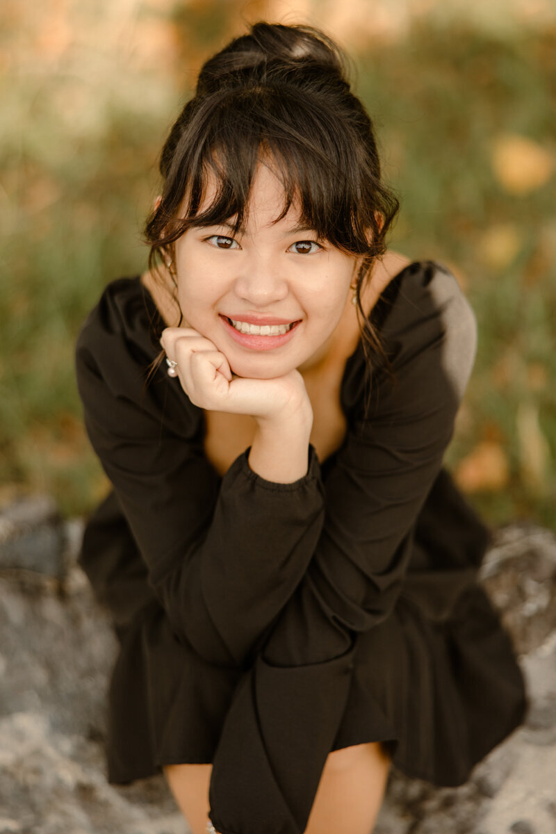 senior girl in black dress